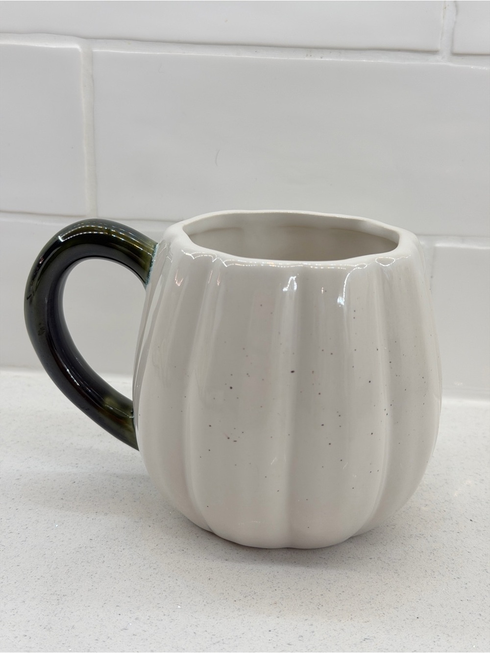 Cream Pumpkin-Shaped Ceramic Mug with Dark Green Handle